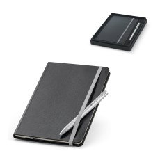 Kit de caderno e esferográfica. Caderno com 160 páginas pautadas e esferográfica com escrita em azul promocional